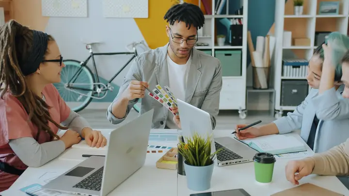 Design team choosing a color palette