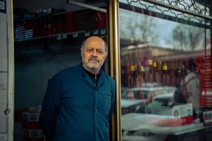 Shops owner at work